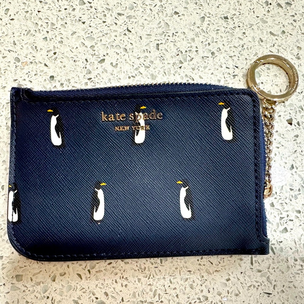 Kate Spade navy leather penquiin key and card holder.  Excellent condition.